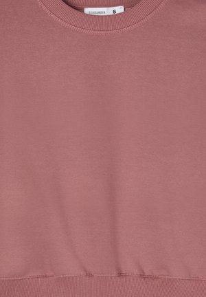 Felpa rosa chiaro realizzata in tessuto morbido. Presenta un collo a girocollo ribattuto e un orlo ribattuto in vita. Etichetta con la scritta "Terranova", taglia S.