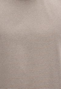 Brown and cream striped fabric with fine horizontal lines, soft texture, smooth finish, and consistent pattern throughout.