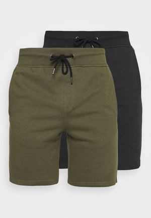 Twee paar casual shorts: één olijfgroen en één zwart. Beide hebben een elastische tailleband met trekkoord en een gladde stoftextuur.