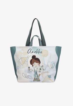 Borsa in tela con manici turchesi, con una ragazza dei cartoni animati che sta in piedi su una pila di libri e disegni geometrici astratti.