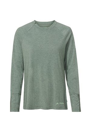 Long-sleeve shirt in muted green, made of soft, textured fabric. Features raglan sleeves and a logo at the lower hem.
