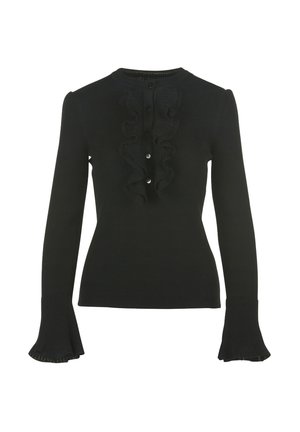 Black long-sleeve ribbed top featuring a round neckline, central ruffle detail, and button closures, with flared cuffs at the wrist.
