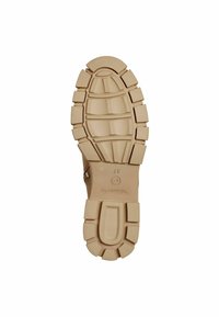 Light brown rubber outsole with deep tread patterns and ridges. Features logo imprint and size markings. Sturdy design for traction.