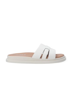 White slide sandals with two parallel straps, a padded footbed, and a flat, textured sole. Branding visible on the footbed.