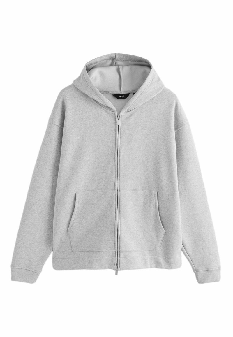 Szara bluza z kapturem zapinana na zamek, wykonana z miękkiego materiału polarowego. Posiada podszyty kaptur, dwie przednie kieszenie oraz ściągacze przy mankietach. Prosty design bez wzorów.