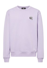 Lavender crewneck sweatshirt gemaakt van katoen, met ribbels bij de mouwen en onderkant, en een klein zwart-wit grafisch logo op de borst.