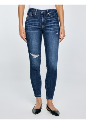 - Jeansy Skinny Fit