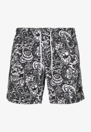 Schwarze Badeshorts mit einem auffälligen, weißen grafischen Muster aus Totenschädeln, Schlangen, Rosen und maritimen Elementen; verstellbarer Kordelzugbund.
