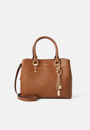 Brown faux leather handbag with two top handles, detachable shoulder strap, gold hardware, and decorative chains with charms.