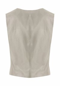 T-shirt sans manches en tissu beige clair, avec un léger éclat, une texture lisse et un design minimaliste avec une légère courbure à la taille.