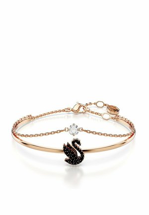 Armband aus Roségold mit einem schwarzen Schwamm-Anhänger, akzentuiert mit einem klaren Kristall. Ketten Design mit einer zarten, glatten Oberfläche.
