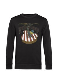 Sudadera negra con un diseño impreso de una guitarra eléctrica con rayas rojas y blancas, un águila y el texto "Lynyrd Skynyrd".