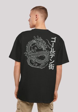 Black cotton t-shirt featuring a large white dragon graphic and Japanese text on the back. Short sleeves and relaxed fit.