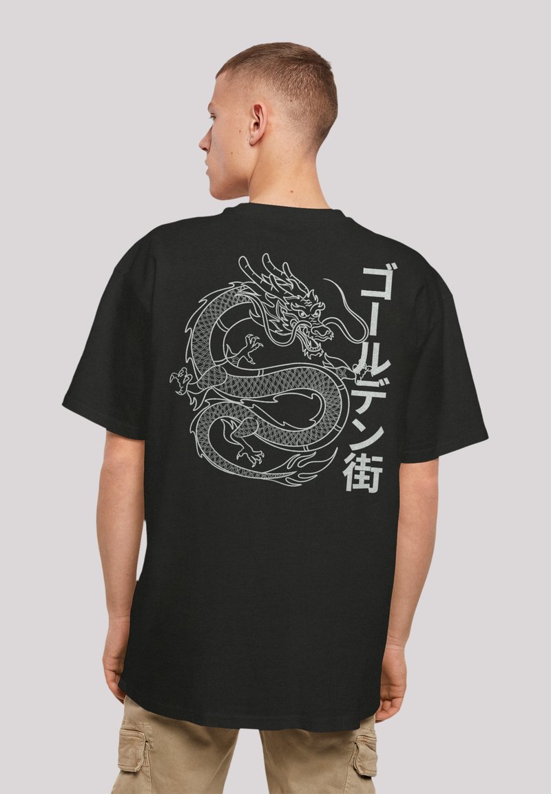 Black cotton t-shirt featuring a large white dragon graphic and Japanese text on the back. Short sleeves and relaxed fit.