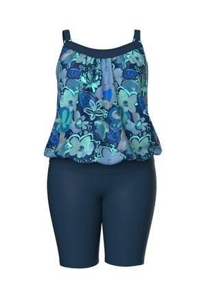 Hihaton kukkakuvioitu tankinitoppi, jossa säädettävät olkaimet, yhdistetty korkeavyötäröisiin tummansinisiin uimashortseihin.