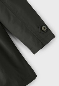 Name it NKFMADELIN  - Trench - black