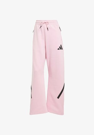 Lyserøde sweatpants med bred bendesign, der har sorte detaljer, justerbar talje og logo på siden. Blødt stof.