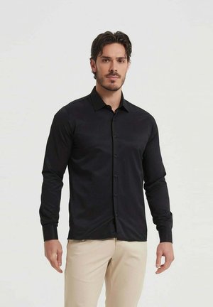 UNI COUPE CONFORT - Chemise - noir