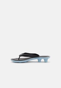 Black and light blue thong sandal with low double-heel and textured sole on a plain background.