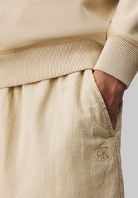 Calvin Klein Jeans Treningo apatinė dalis - pale khaki