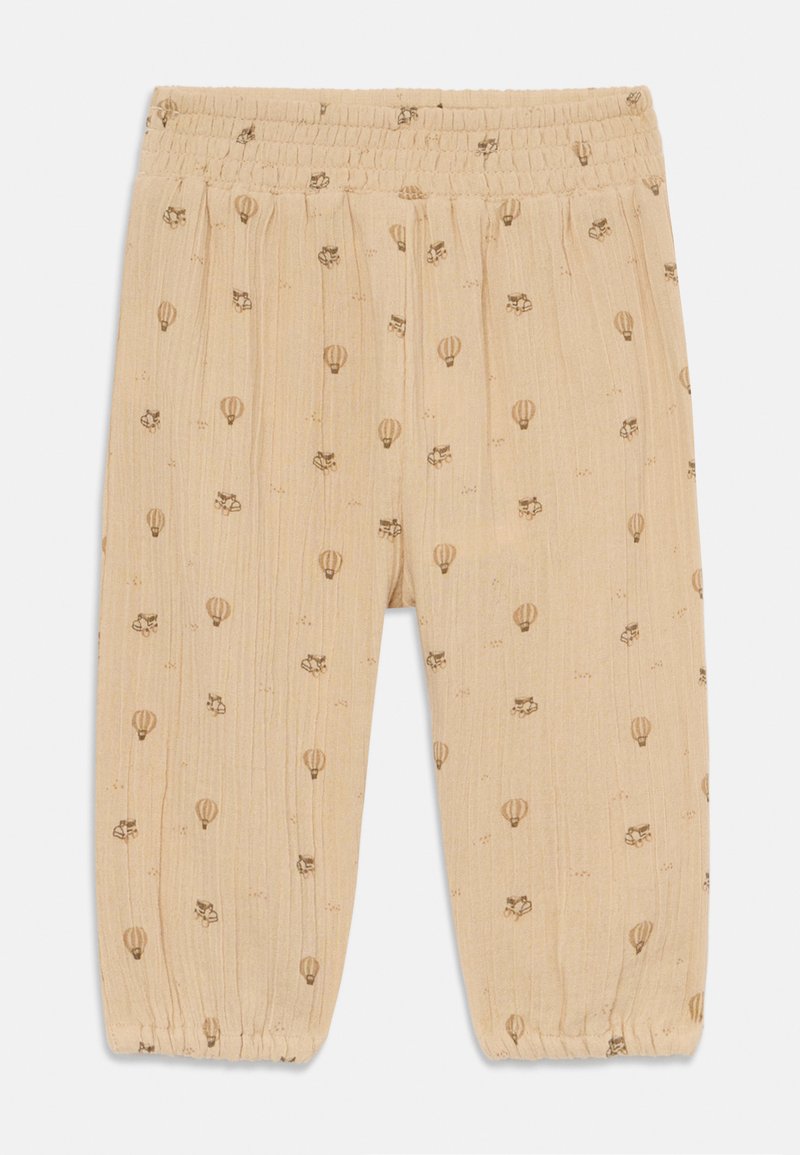 Pantalon en coton beige clair avec une taille élastique, présentant un motif ludique de montgolfières et de petits animaux. 