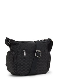 Black crossbody bag made of patterned nylon, featuring a zippered main compartment, front pocket, and adjustable strap with a metal buckle.