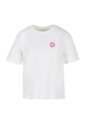 White cotton t-shirt with short sleeves, round neckline, and small pink hibiscus flower graphic on the left chest area.