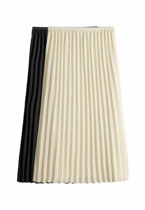 Gonne plissettate nere e crema con vita elastica, che mettono in mostra pieghe verticali e un tessuto testurizzato. Ogni gonna presenta un design alla ginocchia.