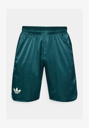 Teal satin shorts with elastic waistband, side pockets, and white Adidas trefoil logo on the left leg. Smooth texture, knee-length design.