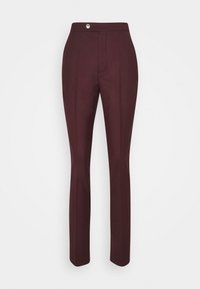 Bordeaux geklede broeken met een taps toelopende pijp, een platte voorkant en een knoopsluiting bij de taille. Gemaakt van een gladde, gestructureerde stof.