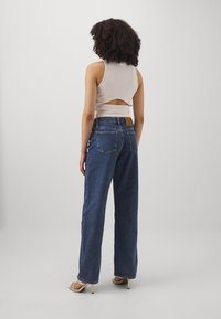 Calvin Klein Jeans LOOSE - Džinsi ar platām starām - blue