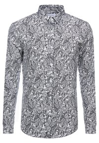Chemise à boutons en motif paisley noir et blanc, avec des manches longues, un col et une fermeture à boutons à l'avant. Fabriquée en tissu léger.
