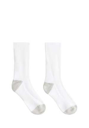 Pair of white crew socks with gray heel and toe sections, displayed flat on a white background.