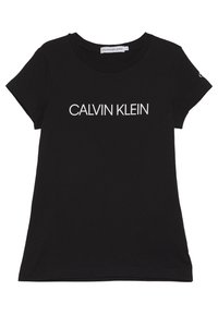 Czarny bawełniany t-shirt z okrągłym dekoltem, krótkimi rękawami i białym logo "CALVIN KLEIN" na piersi. Miękka tekstura, minimalistyczny design.