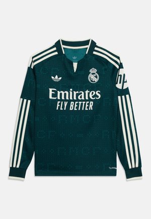Maglia da calcio a manica lunga verde scuro del Real Madrid con strisce bianche, stemma del club, logo Adidas e scritta dello sponsor "Emirates Fly Better".