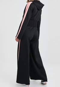 Puma Felpa con cappuccio - black