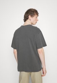 Carhartt WIP NELSON  - Pamata T-krekls - black garment dyed