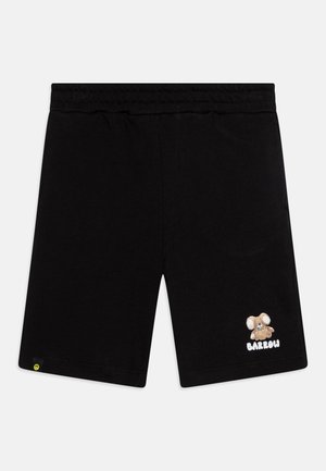 Svart shorts laget av myk stoff, med en brodert mus-design på høyre ben, og en gul aksent ved nederkanten.