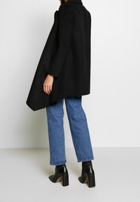 AllSaints Cappotto corto - black