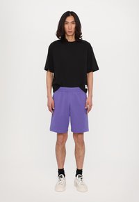 EA7 Emporio Armani Pantalones deportivos - corsican blue