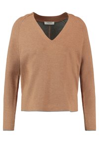 Maglione terracotta a V con maniche lunghe, scollo a costine e vestibilità cropped. Texture morbida con dettagli grigi all'orlo e ai polsini.