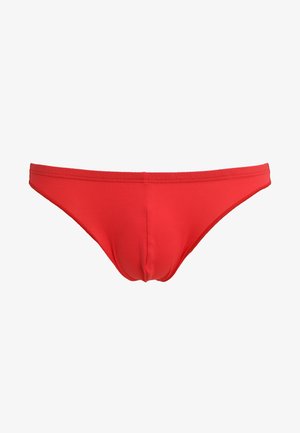 Red bikini bottoms made of smooth fabric, featuring a low-rise cut and minimal coverage design without patterns or embellishments.