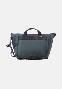 Dark green tote bag made of smooth material, featuring dual handles, a detachable shoulder strap, and a zippered closure. Accented with black trim.