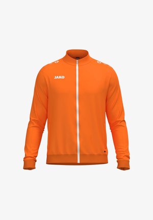 Giacca sportiva arancione brillante a maniche lunghe con zip bianca frontale, collo alto e logo "JAKO" sul petto destro e sulle spalle.