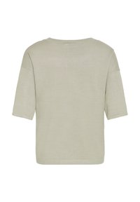 Kurzärmeliges, hellgraues Oberteil aus weichem Stoff. Lockere Passform mit rundem Ausschnitt und einfachem Saum. Glatte Textur mit schlichtem Design.