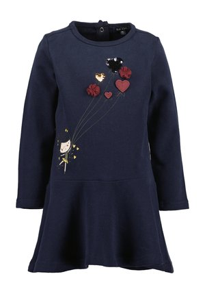 Abito in cotone blu navy con maniche lunghe e orlo svasato, decorato con ricami floreali e un personaggio che tiene dei palloncini, arricchito da paillettes e cuori di stoffa.