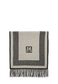 Hallitusest koosnev pehme pleed heledashallides tooni mustade triipudega ja franged servadega. Keskel on monogrammilogo.