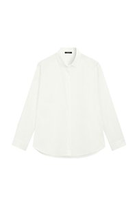 Camicia bianca a maniche lunghe realizzata in tessuto leggero. Presenta un colletto classico, chiusura con bottoni e orlo arrotondato. Texture liscia, design minimalista.