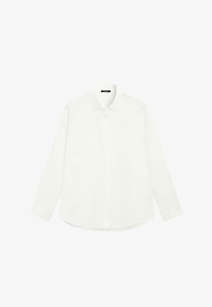 Bílá košile s dlouhým rukávem vyrobená z lehkého materiálu. Má klasický límeček, zapínání na knoflíky a zaoblený lem. Hladká textura, minimalistický design.