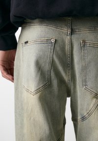 Don't Waste Culture MACAU UNISEX - Traperice opuštenog kroja - acid pale